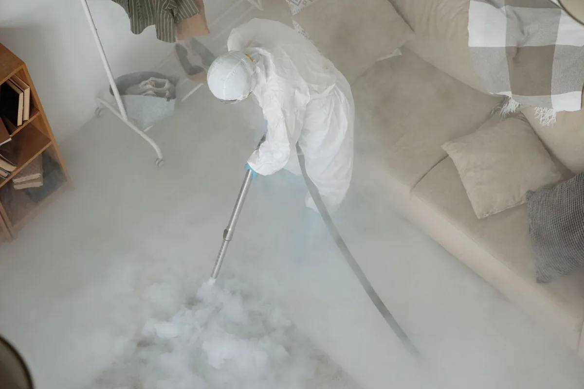 Biohazard cleanup technician in protective equipment, Monona, WI